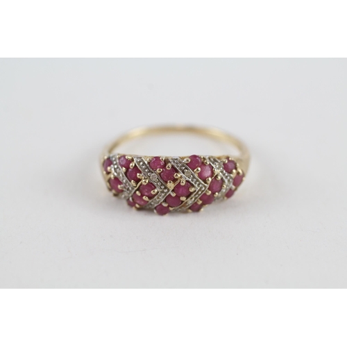 81 - 9ct gold diamond & ruby dress ring (1.8g) Size  P