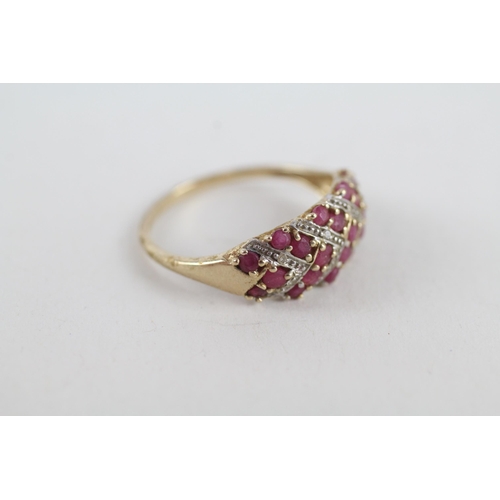 81 - 9ct gold diamond & ruby dress ring (1.8g) Size  P