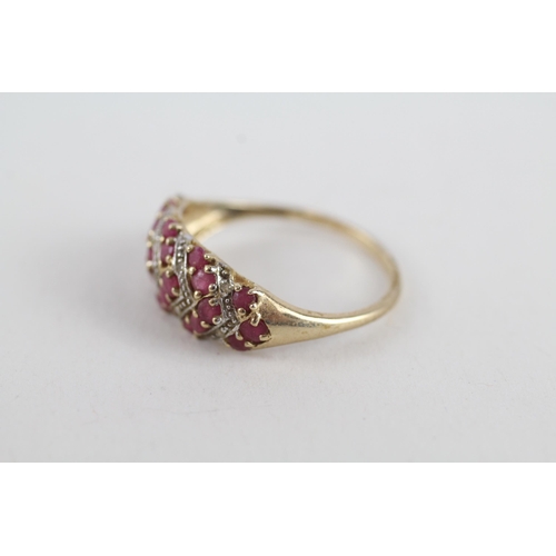 81 - 9ct gold diamond & ruby dress ring (1.8g) Size  P