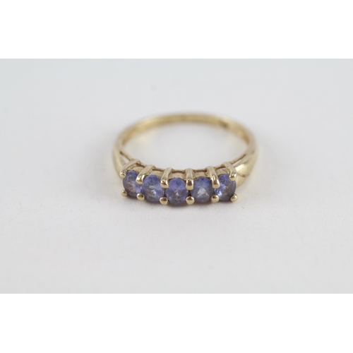 89 - 9ct gold tanzanite five stone ring (2g) Size  P