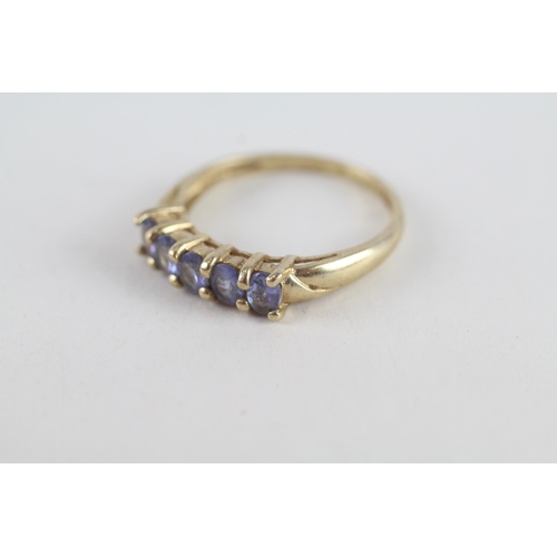 89 - 9ct gold tanzanite five stone ring (2g) Size  P