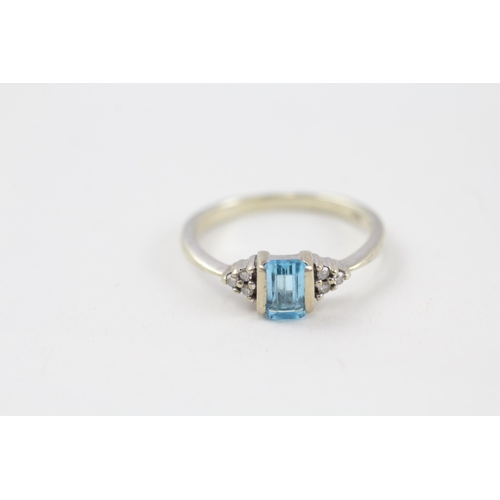 94 - 9ct white gold diamond & topaz trefoil ring (2.3g) Size  N 1/2