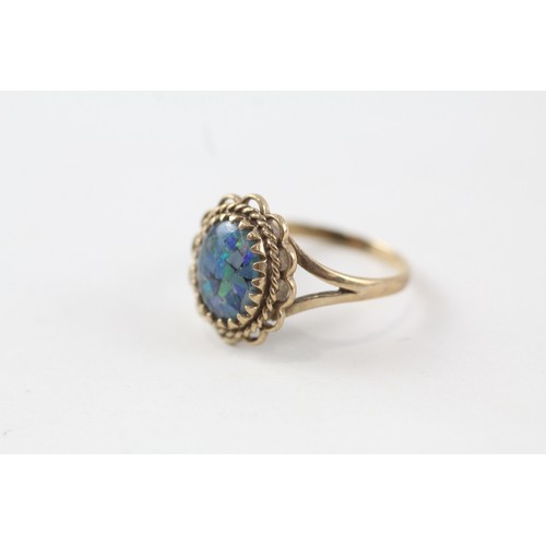 102 - 9ct gold mosaic opal triplet ring with wavy openwork frame (2.4g) Size  N