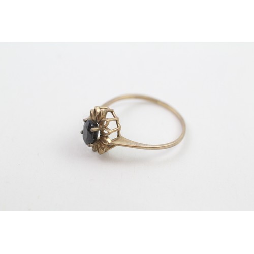 154 - 9ct gold sapphire single stone ring with openwork frame (1.2g) Size  N