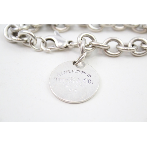 211 - Silver belcher link bracelet with round tag by designer Tiffany & Co (38g)