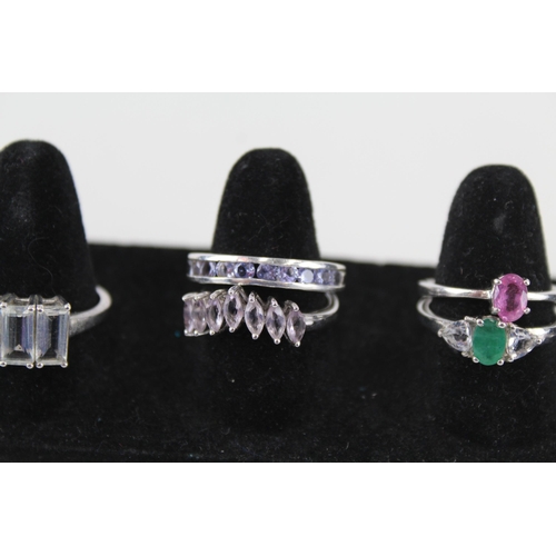 228 - A collection of silver gemstone rings including Emerald (20g)