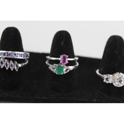 228 - A collection of silver gemstone rings including Emerald (20g)