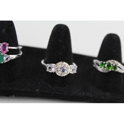 228 - A collection of silver gemstone rings including Emerald (20g)