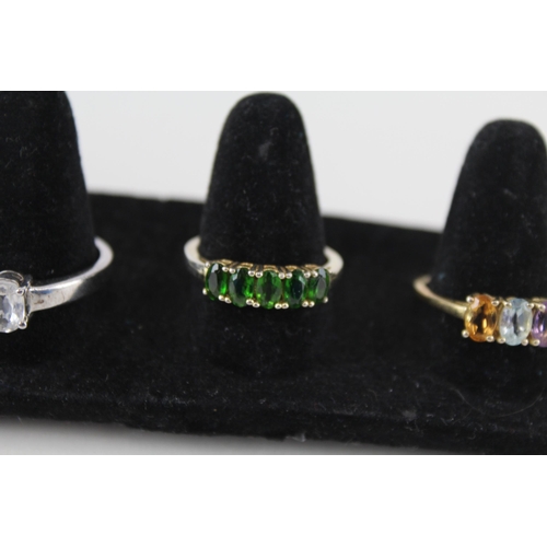 229 - A collection of silver gemstone rings including Diopside (20g)