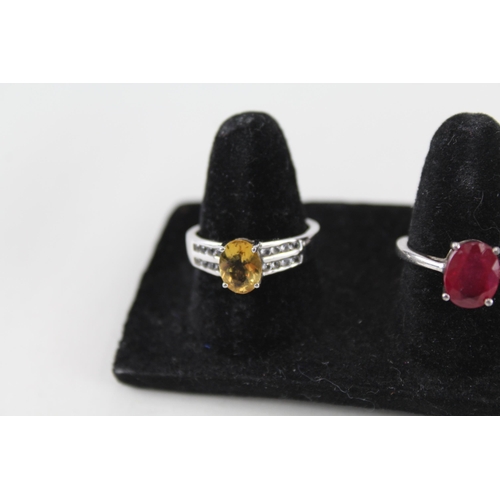 230 - A collection of silver gemstone rings including Ruby (21g)