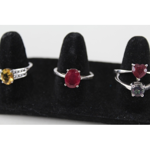 230 - A collection of silver gemstone rings including Ruby (21g)