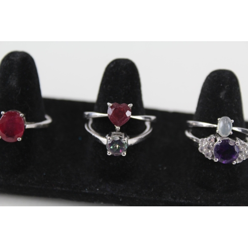 230 - A collection of silver gemstone rings including Ruby (21g)