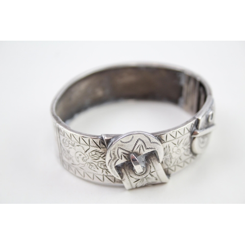 238 - Silver antique buckle design bangle (24g)