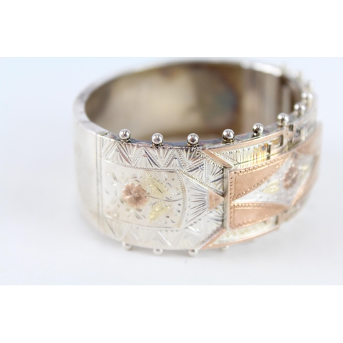 239 - Silver antique bangle with gold accents (38g)