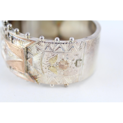 239 - Silver antique bangle with gold accents (38g)