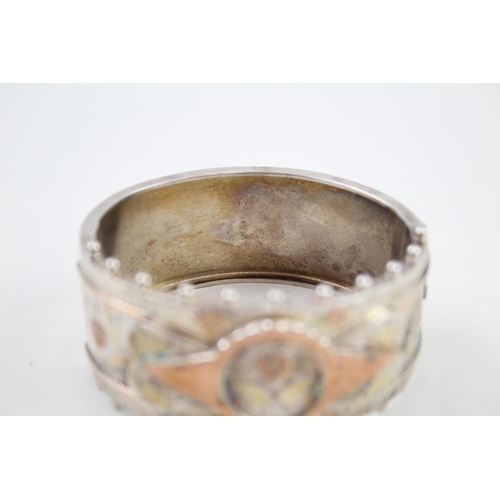 240 - Silver antique bangle with gold accent floral detail (39g)