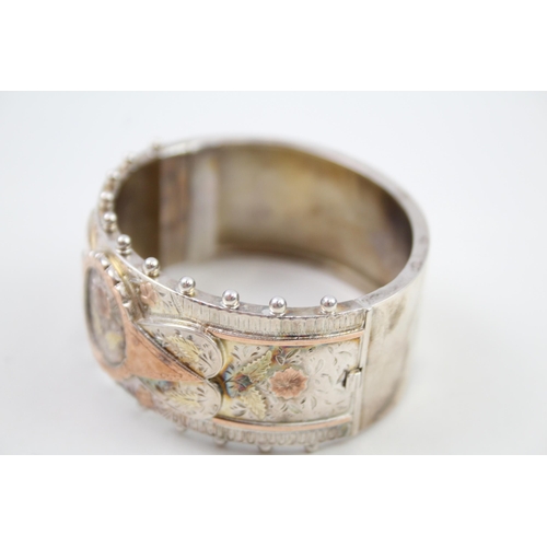 240 - Silver antique bangle with gold accent floral detail (39g)