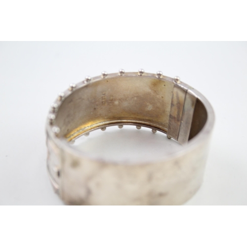 240 - Silver antique bangle with gold accent floral detail (39g)