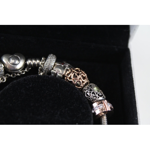 244 - Silver charm bracelet and charms by Pandora w/ box (44g)