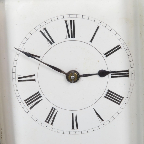 391 - Mid sized carriage clock with chiming mechanism - clock runs 130mm x 90mm