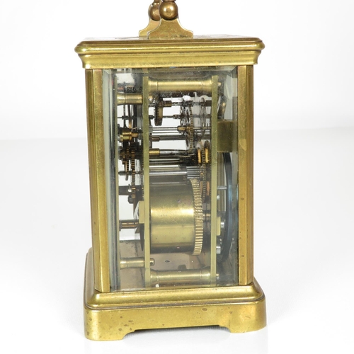 391 - Mid sized carriage clock with chiming mechanism - clock runs 130mm x 90mm