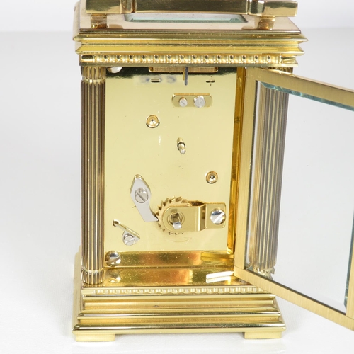 392 - Mid sized carriage clock by Taylor and Bligh of London clock runs 125mm x 85mm