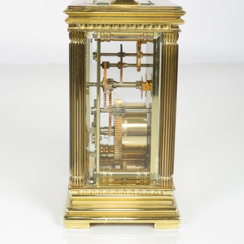 392 - Mid sized carriage clock by Taylor and Bligh of London clock runs 125mm x 85mm