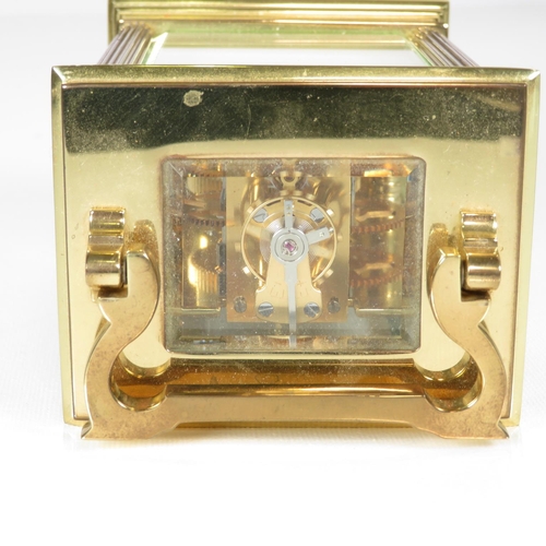 392 - Mid sized carriage clock by Taylor and Bligh of London clock runs 125mm x 85mm