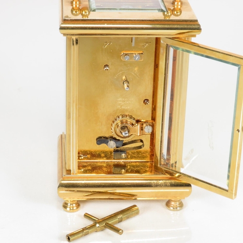 393 - Mid sized carriage clock by John Morley made in England clock runs 120mm x 80mm