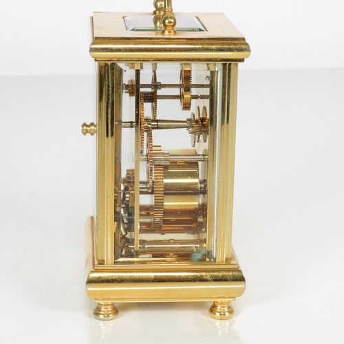 393 - Mid sized carriage clock by John Morley made in England clock runs 120mm x 80mm