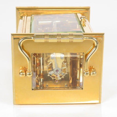 393 - Mid sized carriage clock by John Morley made in England clock runs 120mm x 80mm