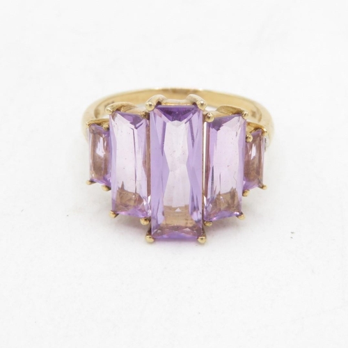 91 - 9ct gold amethyst five stone cocktail ring with diamond sides (3.8g) Size  P