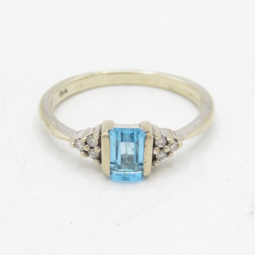 94 - 9ct white gold diamond & topaz trefoil ring (2.3g) Size  N 1/2