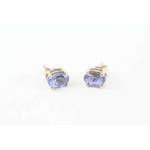 9ct gold oval cut tanzanite stud earrings in a four claw setting (1.3g)