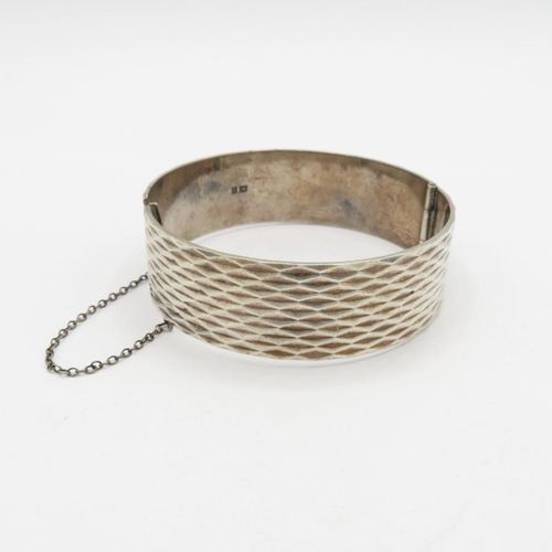 Silver bangle with safety chain  43.2g  total weight