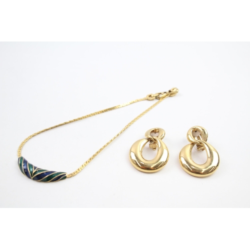 A vintage gold tone enamel necklace and pair of clip on earrings by designer D'Orlan (g)
