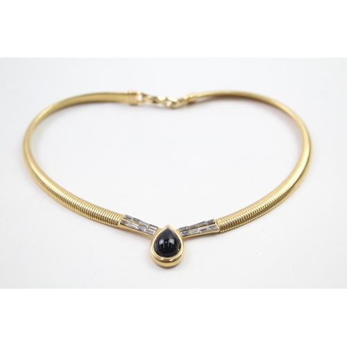 A gold tone necklace by designer D'Orlan (g)