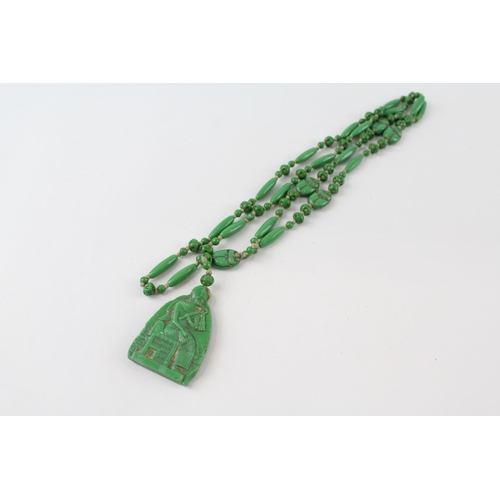 An Egyptian revival Czech pressed glass beaded necklace by the Neiger brothers (g)