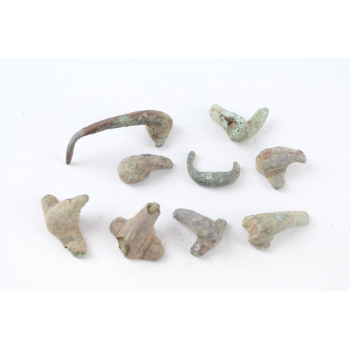 A collection of partial Roman trumpet brooches archaeological metal detectorist finds (g)