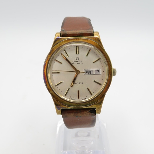 Omega Geneve Gents Vintage gold plated wristwatch.  Automatic. Working.  Screwdown presentation  caseback.  Brown leather strap.
