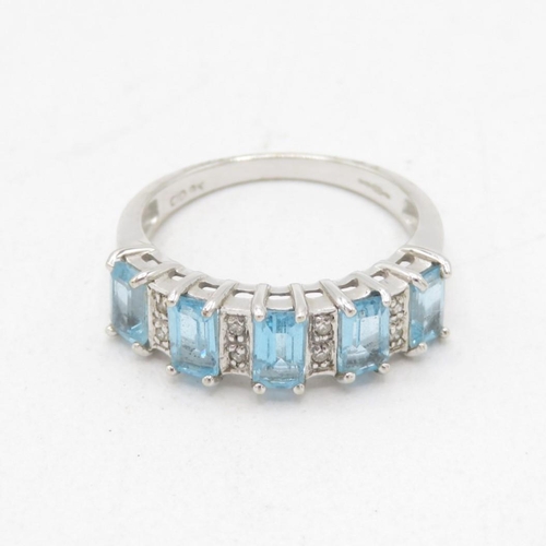 9ct white gold emerald cut blue topaz & diamond half eternity ring (2.9g) Size  N