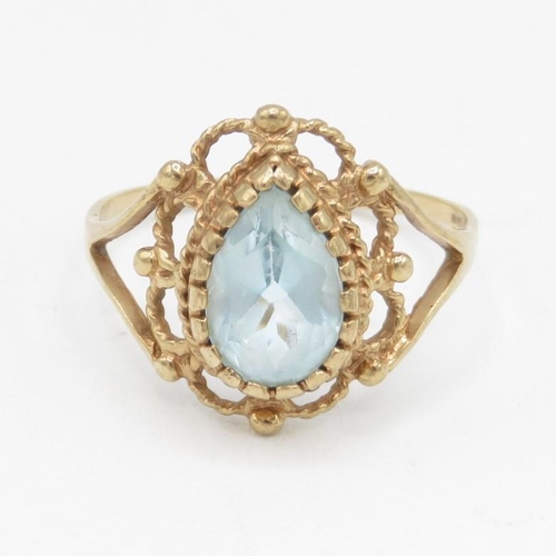 9ct gold pear cut blue topaz dress ring (1.9g)  - MISHAPEN - AS SEEN  Size  N
