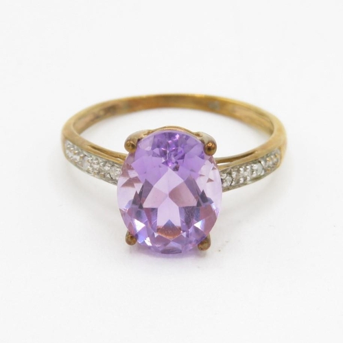 9ct gold oval cut amethyst ring with diamond shoulders (1.8g) Size  L