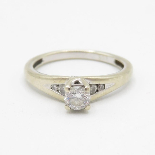 9ct gold round brilliant cut diamond solitaire ring with diamond shoulders (2.4g) Size  M
