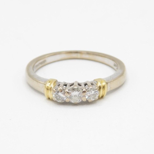18ct gold round brilliant cut diamond three stone ring, Sponsor's Mark: Alfred Terry Ltd (3.5g) Size  M