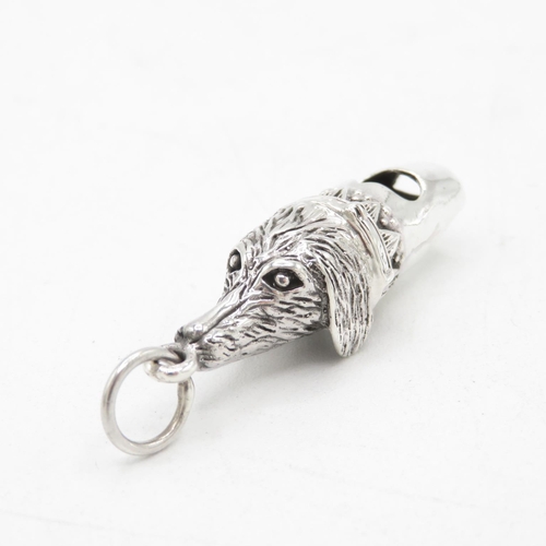 HM 925 Sterling Silver dog whistle with fob ring and detailed dog head design fully working (11.3g)  45mm long.  In excellent condition