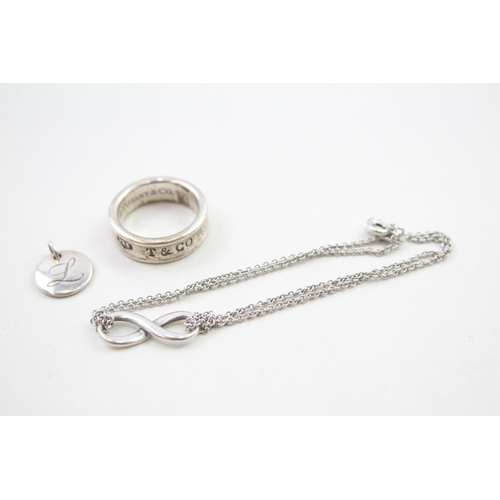 A silver bracelet, ring and pendant by Tiffany and Co (13g)