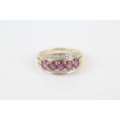 9ct gold oval cut purple garnet & diamond dress ring   2.6 g