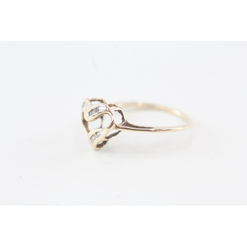 101 - 9ct gold diamond openwork heart ring Size L 1.3 g