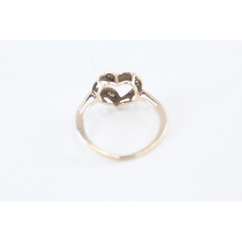 101 - 9ct gold diamond openwork heart ring Size L 1.3 g